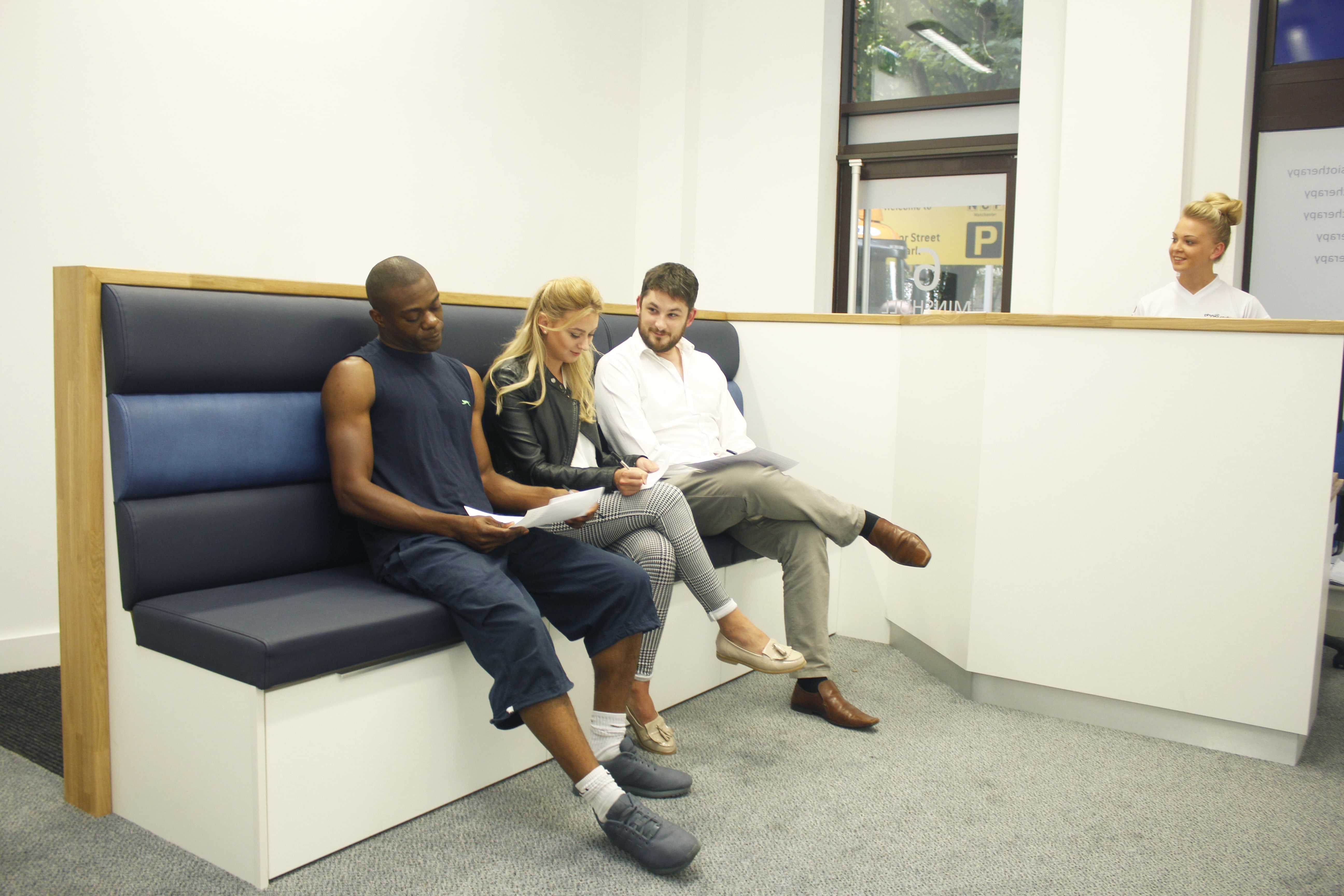 Minshull street reception greeting with physiotherapists