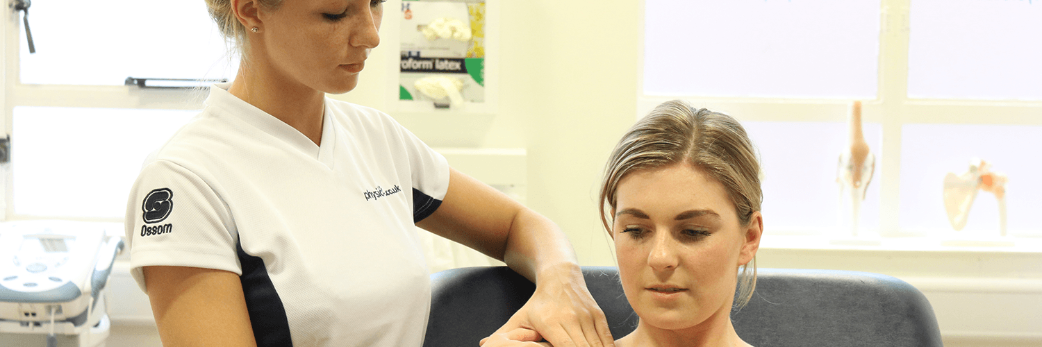 Female recieves sports massage in the shoulder area to aid in sports injury recovery.