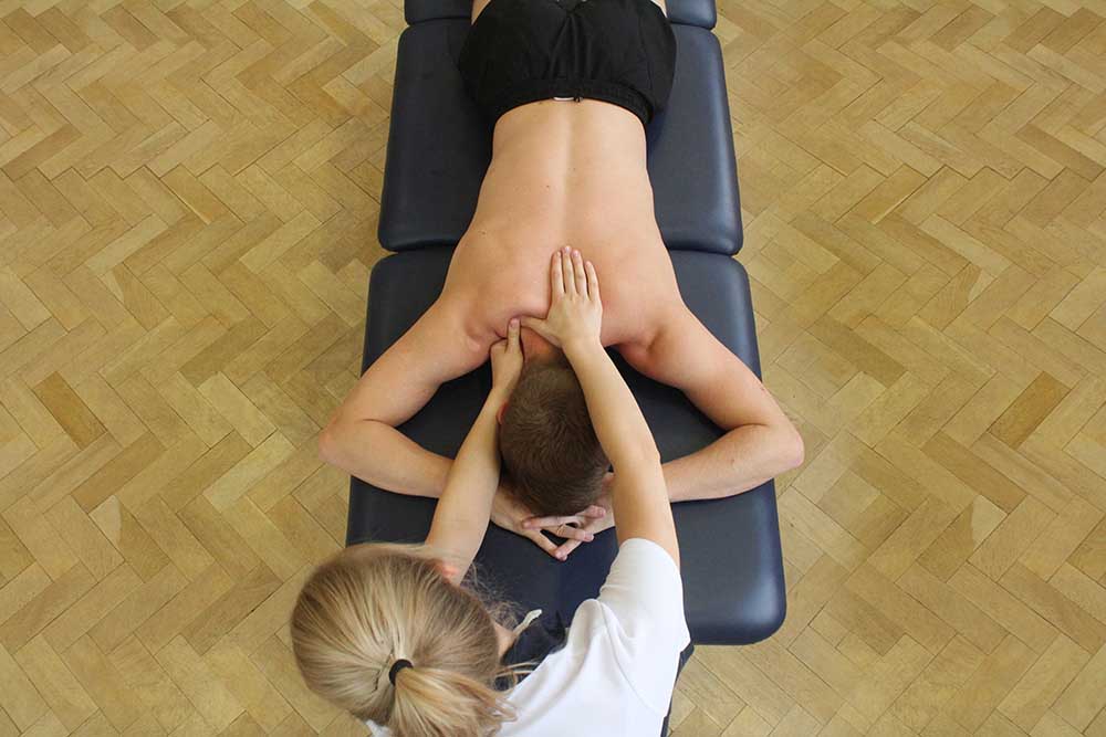 Soft Tissue Massage targeting trapezius back muscles