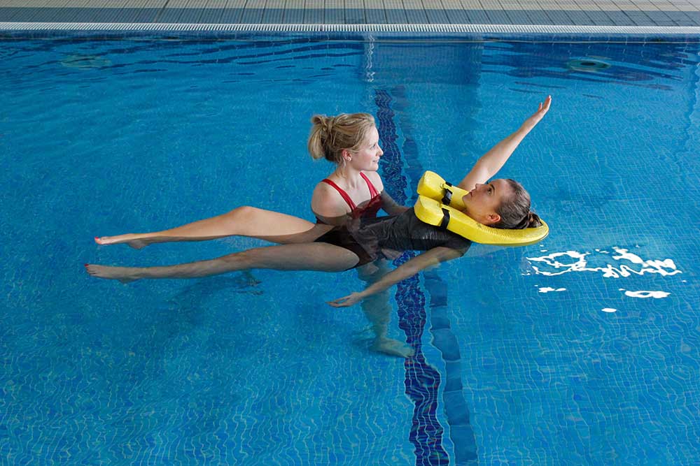 Hydrotherapy session with close supervision from specialist physiotherapist