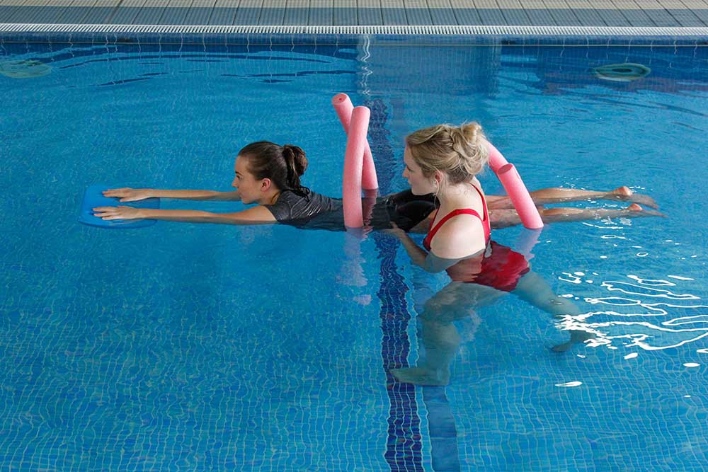 Hydrotherapy session with close supervision from specialist physiotherapist