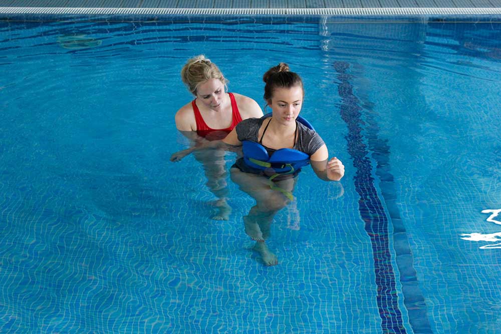 Hydrotherapy session with close supervision from specialist physiotherapist