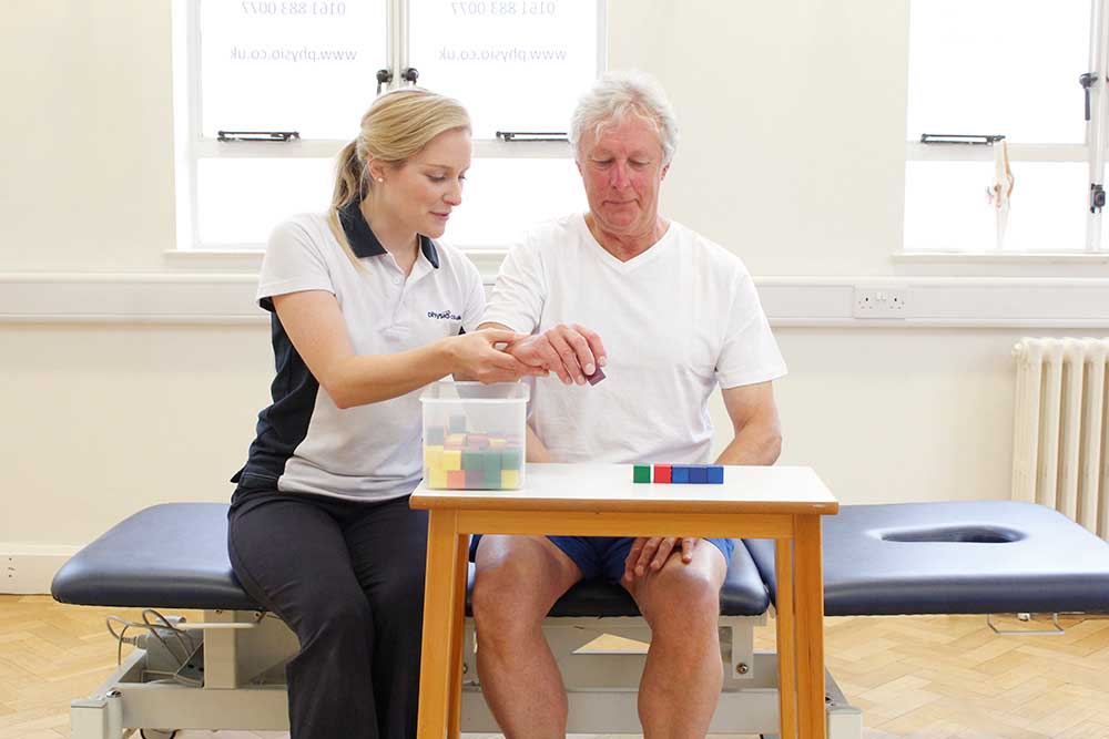 Fine motor skill exercises supervised by a specilaist neurological physiotherapist Fine motor skill exercises supervised by a specilaist neurological physiotherapist
