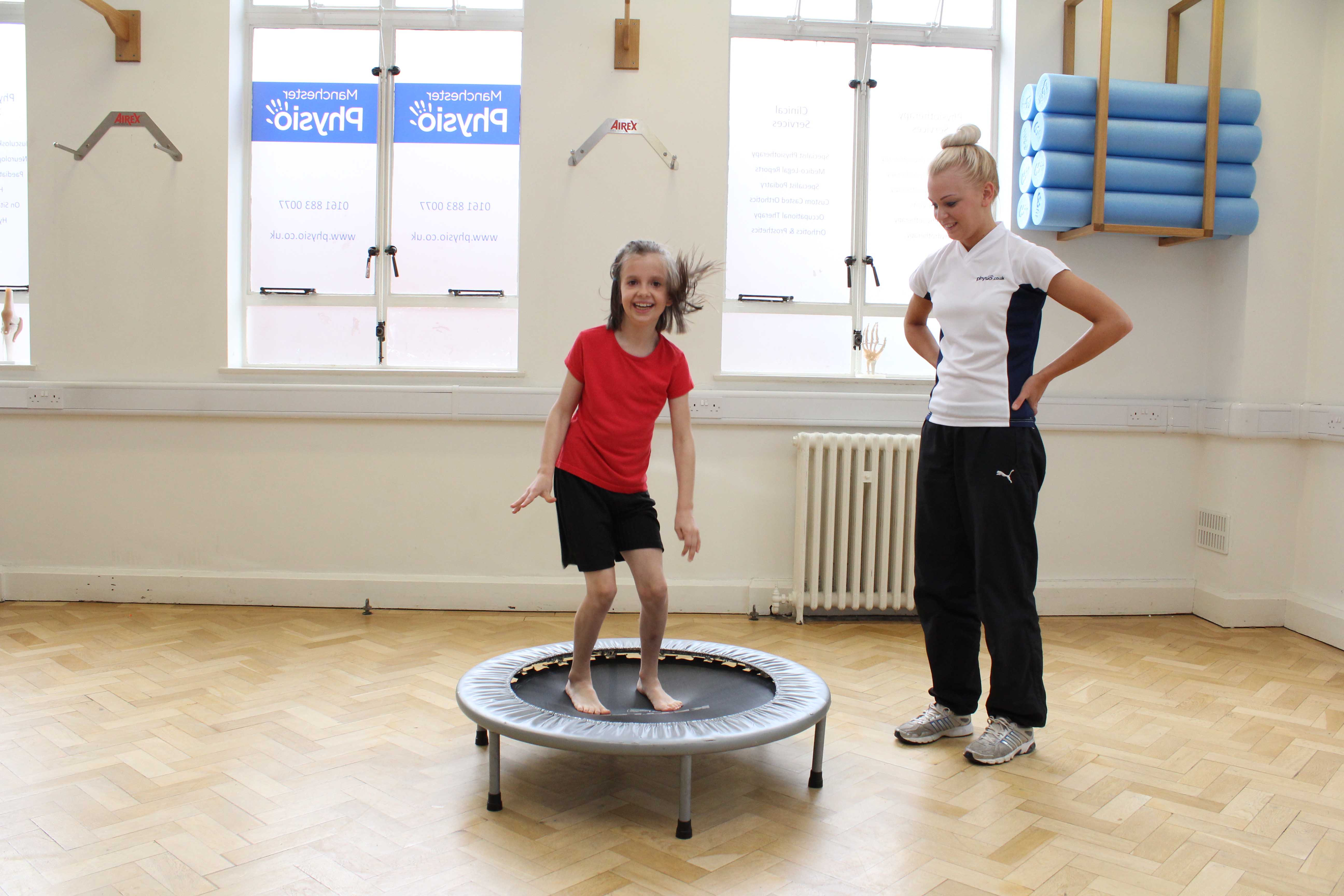 Core stability and toning exercises supervised by a paediatric physiotherapist