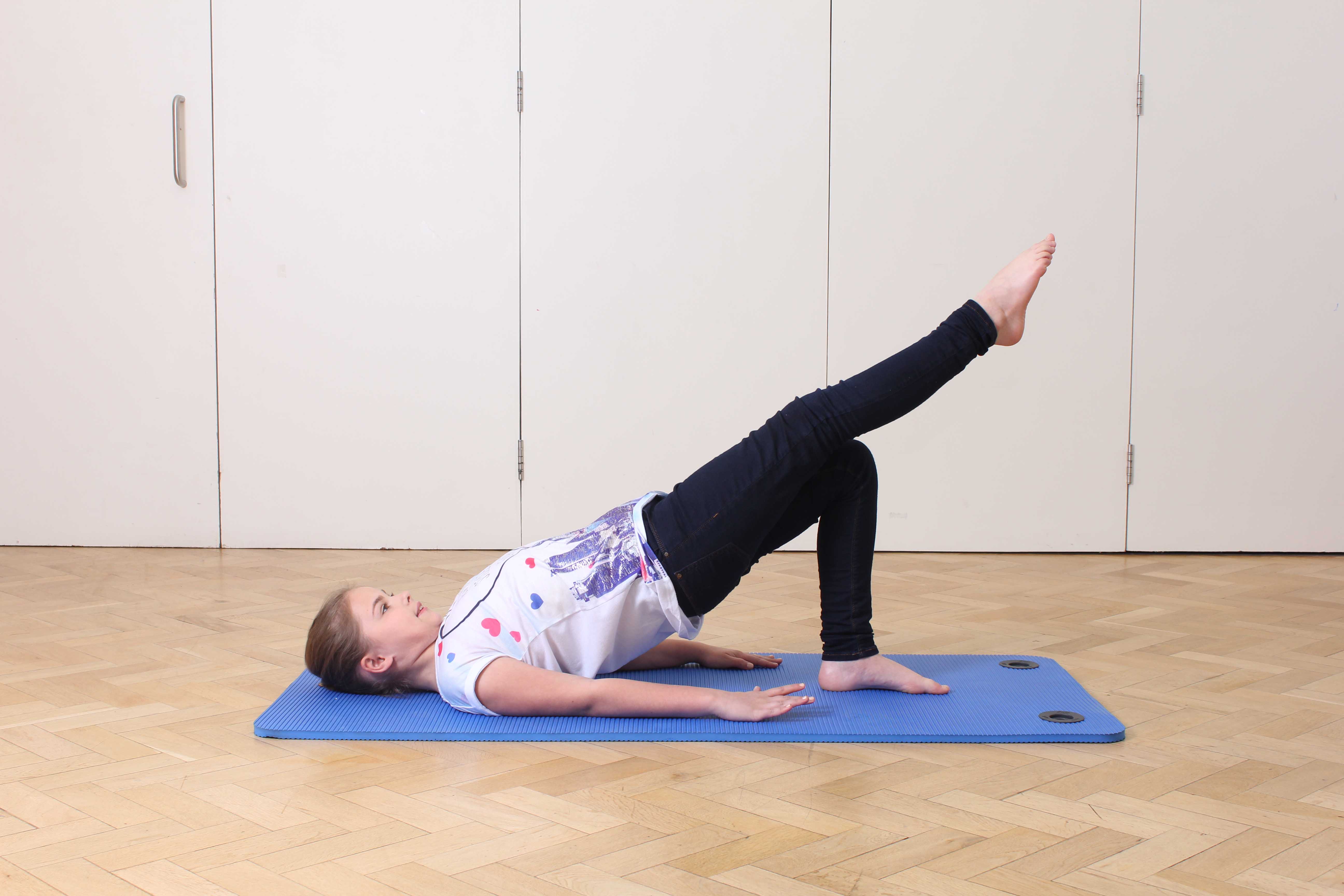 Strengthening and toning exercises for the hip and pelvis supervised by a paediatric physiotherapist