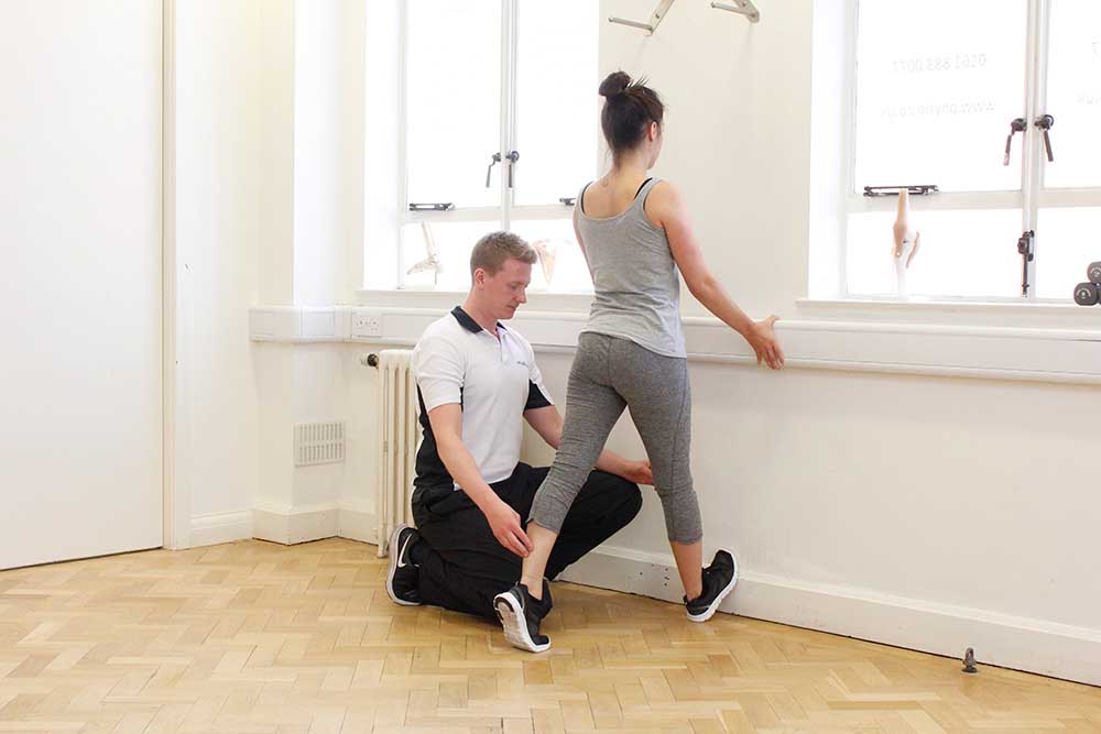 Ankle and calf stretches supervised by an experienced physiotherapist
