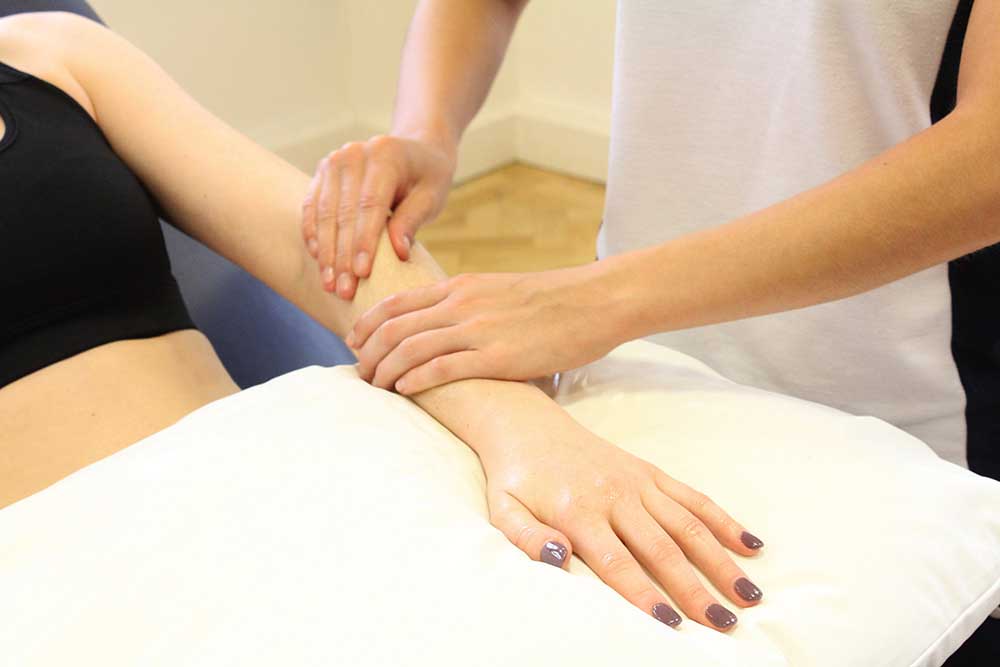 Post injury massage of extensor capri ulnaris and digitorum to aid recovery.
