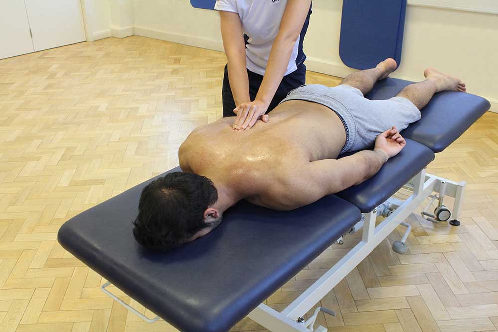 Pre event massage of trapezius and rhomboid muscles