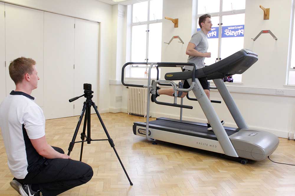 Our physiotherapist advising a patient on some exercises to manage lower back pain.