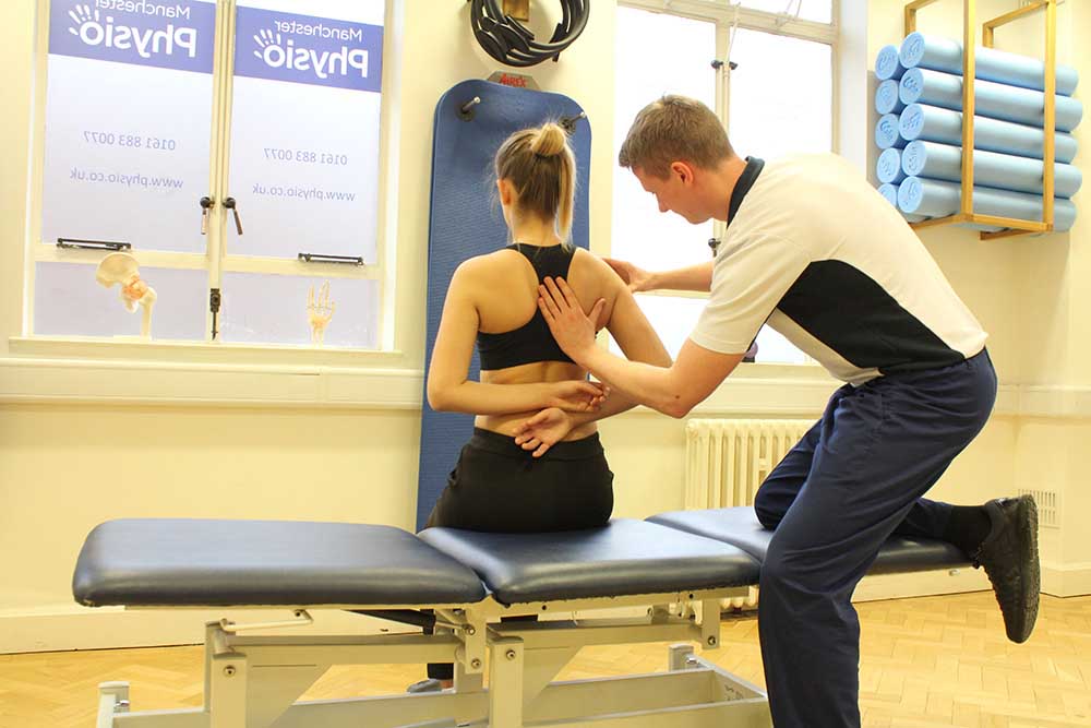 Scapula setting assessment and exercises performed by an experienced physiotherapist