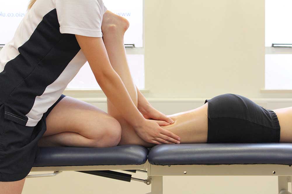 Therapeutic massage focused on biceps femoris and vastus lateralis