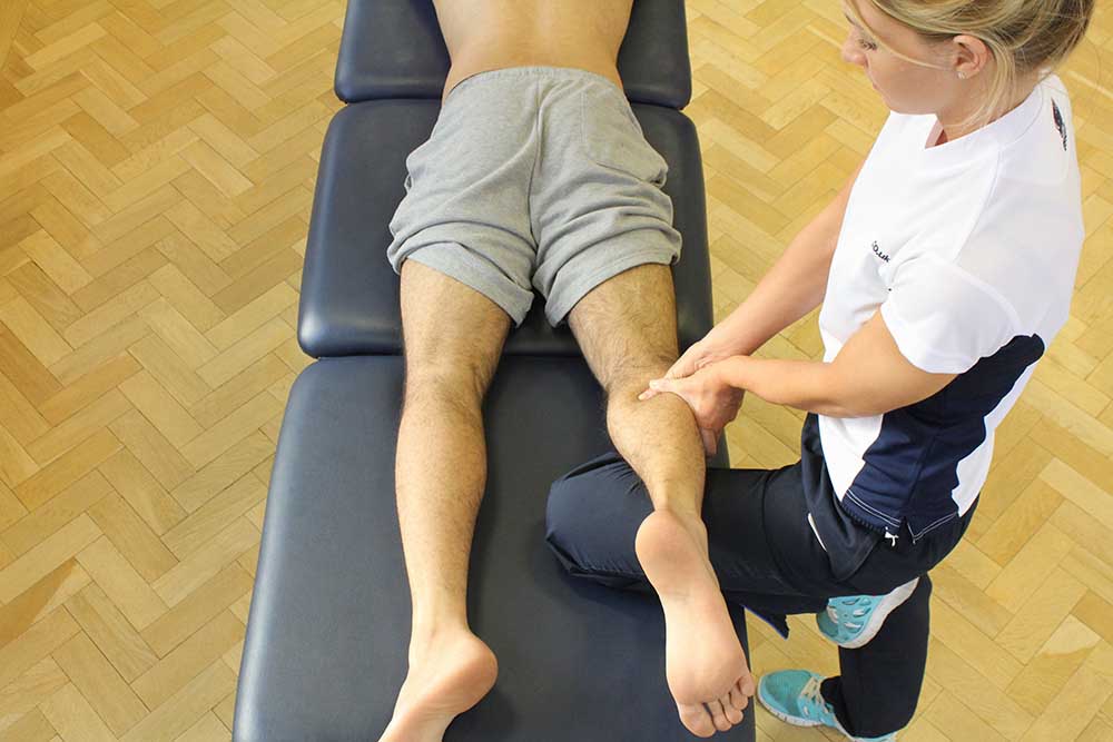 Trigger point massage on gastrocnemius