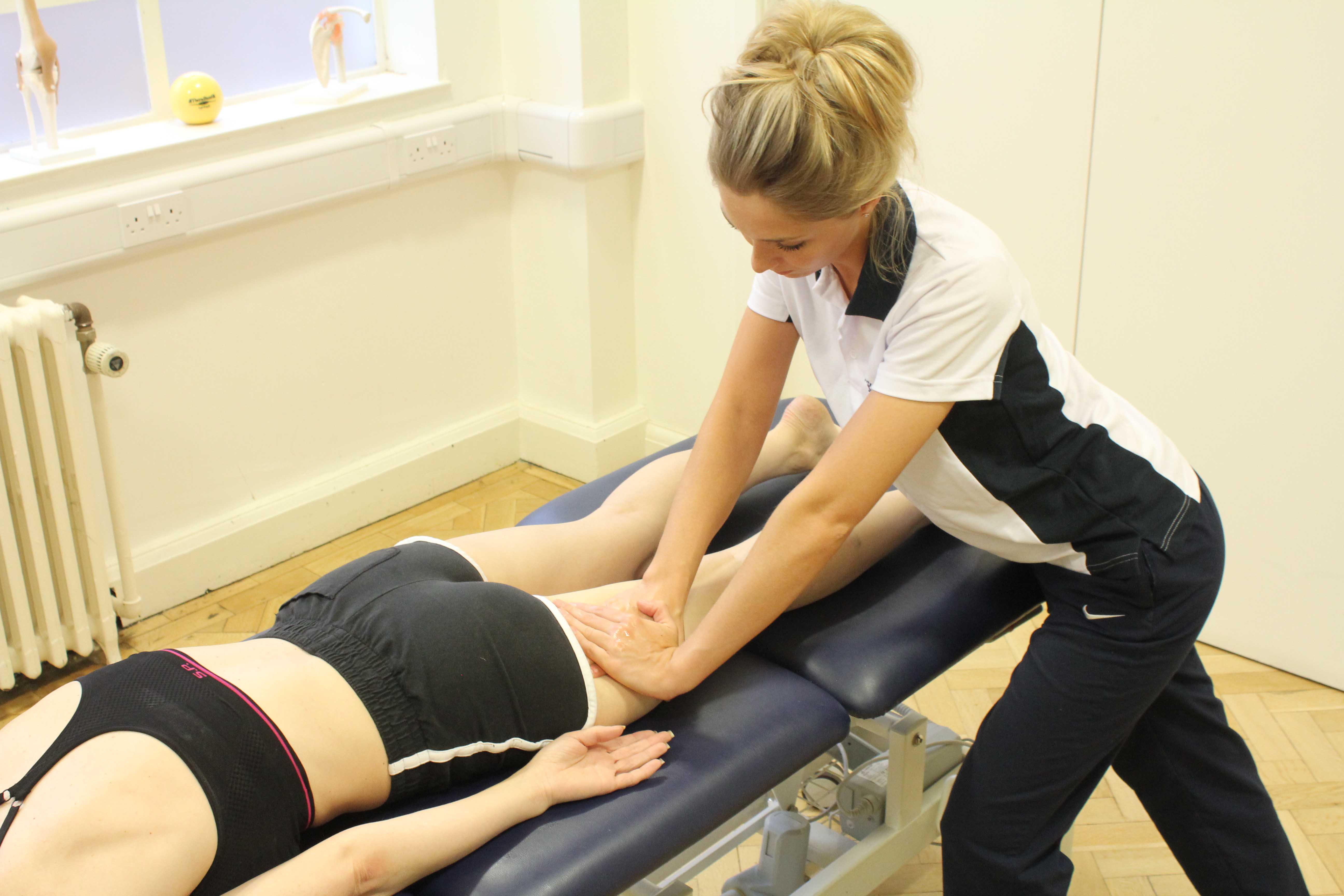 Soft tissue massage of the quadricep muscles by a specialist MSK therapist Soft tissue massage of the quadricep muscles by a specialist MSK therapist
